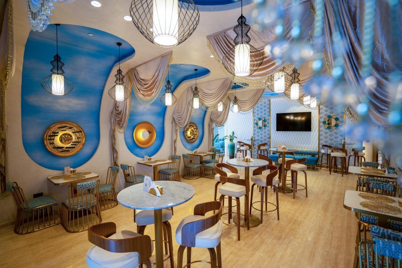 Velero Hotel Doha Lusail Екстериор снимка The interior of the restaurant