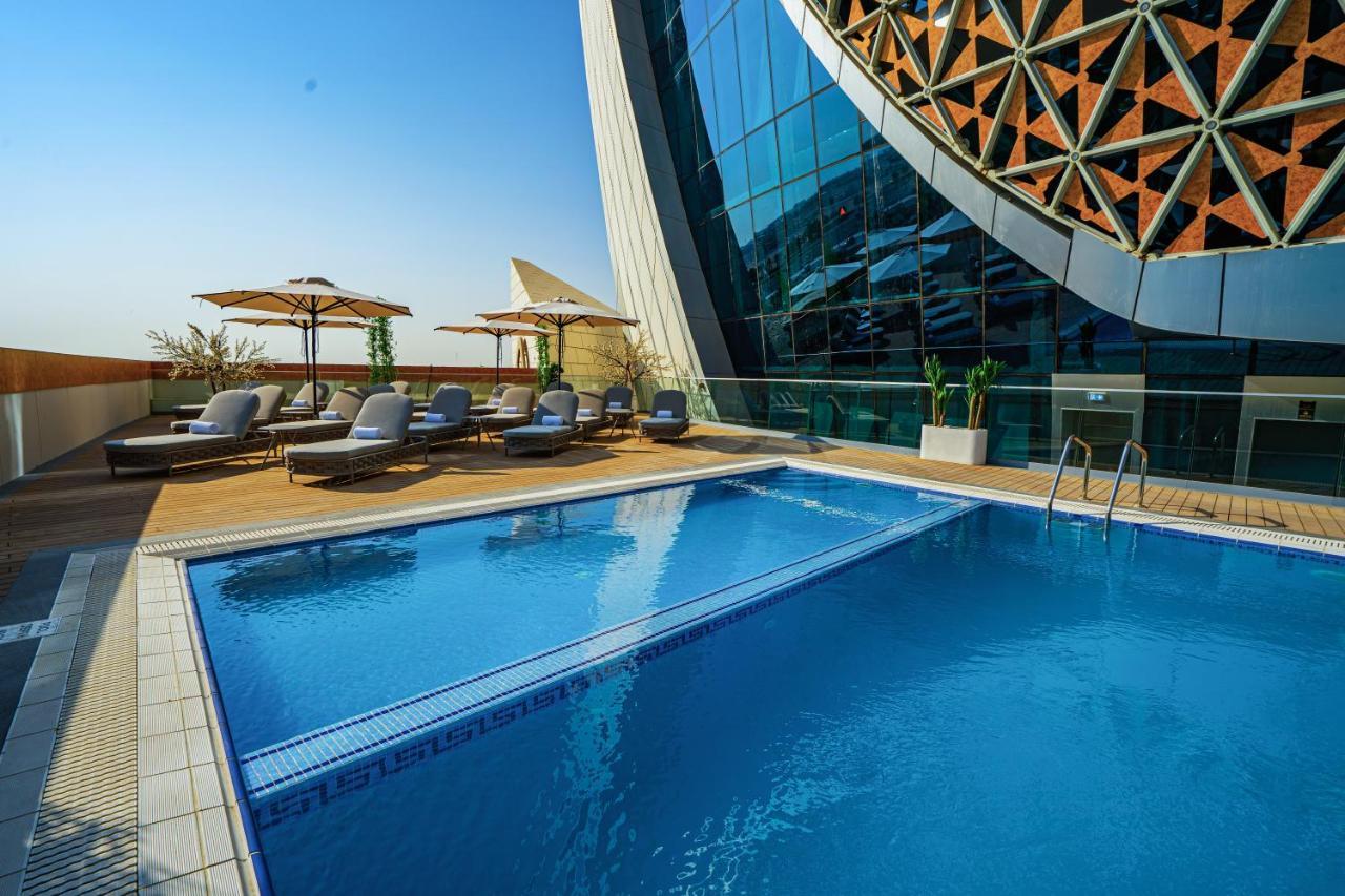 Velero Hotel Doha Lusail Екстериор снимка The swimming pool at the hotel